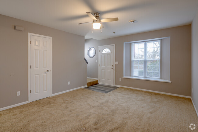 2BR, 1.5BA - 1,200SF - Living Room - Bristol Cove Apartments LLC