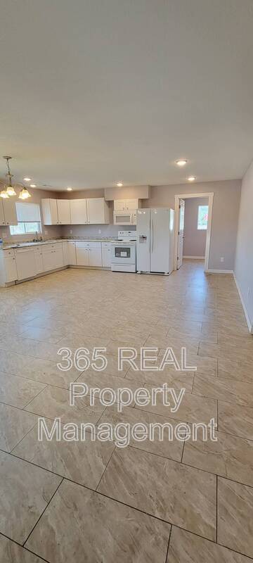 Building Photo - 3311 11 Avenue - Unit A