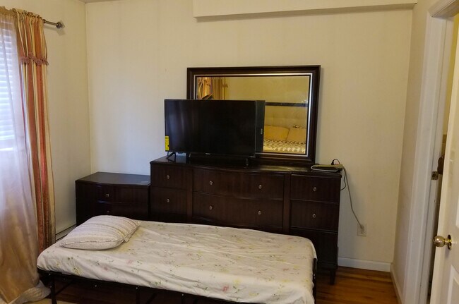 An extra bed in the Master Bedroom - 560 Van Siclen Ave