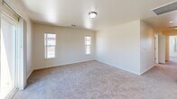 Located at 405 Eastwood Ave in Manteca, California, this well-designed 2-bedroom, 2-bathroom residence offers a comfortable and functional single-floor layout. The living room serves as the heart of the home, featuring plush carpeting, natural light from surrounding windows, and sliding glass doors that open to a private balcony — ideal for enjoying outdoor views.

The kitchen is a standout feature, boasting rich dark-espresso cabinetry, light-toned countertops, and a full suite of stainless steel appliances including a gas range, refrigerator, and dishwasher. A convenient pass-through window connects the kitchen to the living area, enhancing the open feel of the space. Light tile flooring completes the kitchen's clean, modern aesthetic.

Both bedrooms are generously proportioned, finished with soft carpeting and windows that invite natural light. The primary bedroom offers ample space and includes closet access. The second bedroom also features a window with neighborhood views.

Each bathroom is finished with neutral tile flooring, a tub-shower combination with tiled surrounds, and vanity with dark cabinetry. The primary bathroom features a dual-sink vanity, adding a practical touch. Throughout, the residence maintains a clean, neutral palette that creates a bright and welcoming atmosphere.