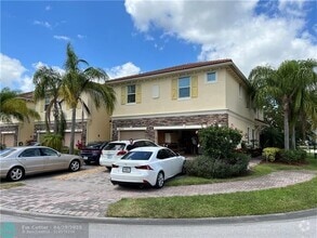 Building Photo - 9428 SW Merlin Ct