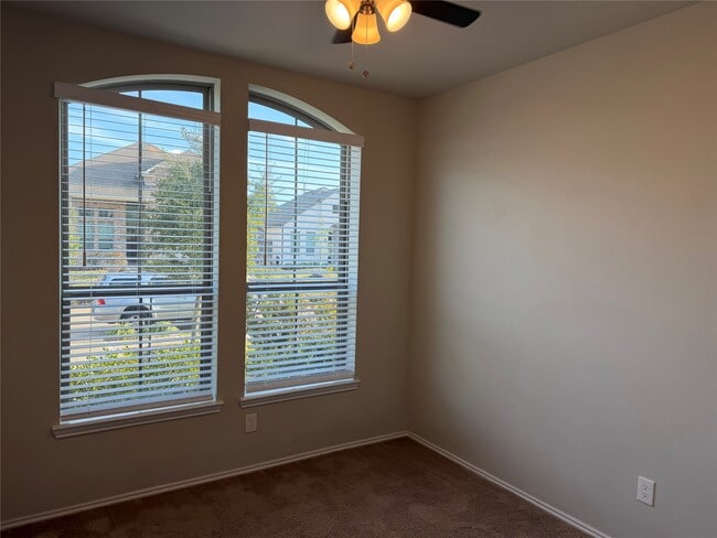 Building Photo - 8711 Windsong Trail Dr