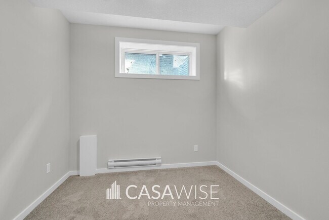 Building Photo - 21103-21125 25 Ave NW