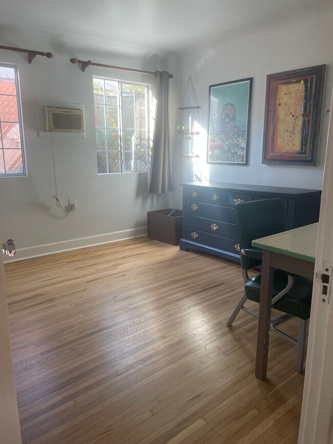 The room is big enough for a full bed and several pieces of furniture or a larger bed. - 6619 Willoughby Ave