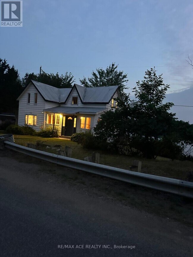 Photo du bâtiment - 716 County Rd 15
