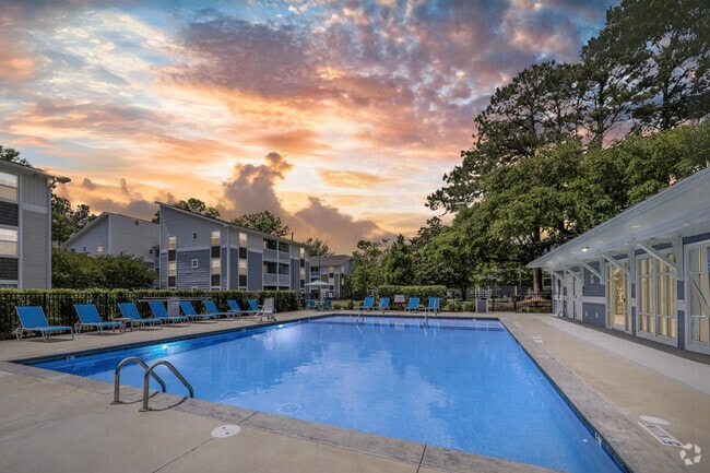 Pool Area at Village Green Apartments in Wilmington, NC - Village Green Apartment Homes