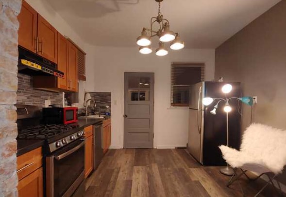 Primary Photo - Spacious 4-Bedroom Home with Basement & Pa...