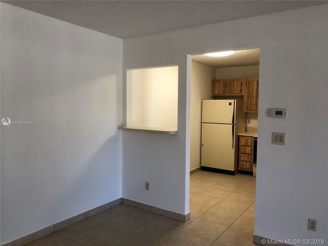 Building Photo - 10716 Royal Palm Blvd