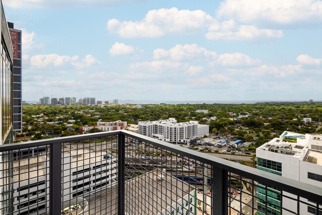 Private balcony with city views - Avalon Merrick Park