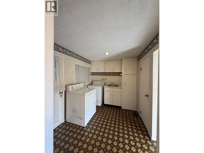 Photo du bâtiment - 11804-11232 232 St