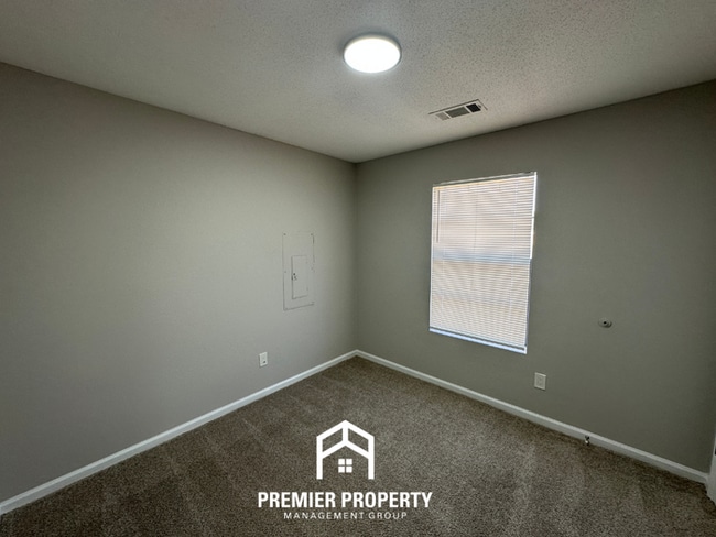 Photo - Spacious 4BR/2BA Home in 38141 | Vinyl Flooring & Large Fenced Backyard