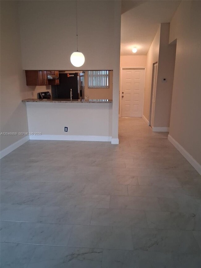 Building Photo - 10907 Royal Palm Blvd
