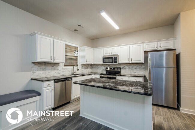 Foto del edificio - 7108 Snodgrass Hill Ct