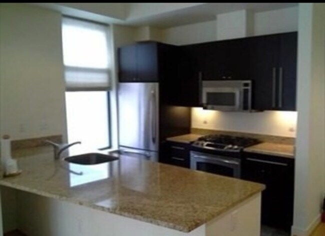 Building Photo - 700 Harrison Ave