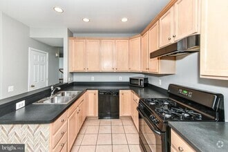 Building Photo - 5077 Village Fountain Pl