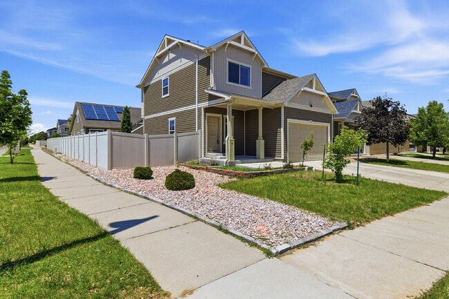 Photo - $2,940.95 - 4 Bed, 3 Bath Home in Denver with Central A/C and Fenced in Yard!