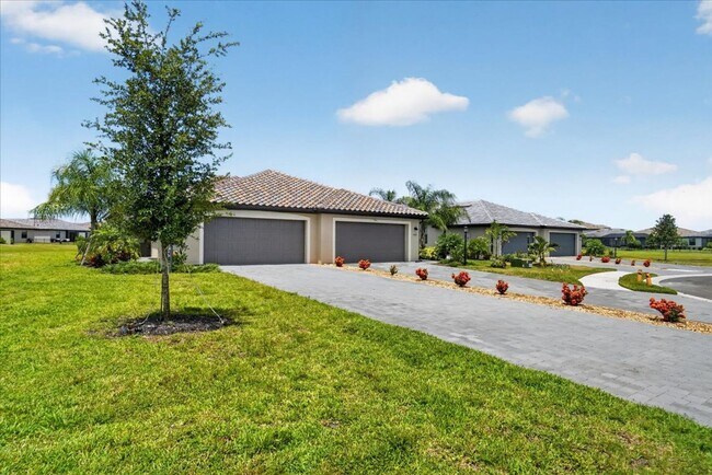 Building Photo - New Construction 2 Bedroom PLUS a Home Office Available in Lorraine Lakes