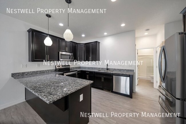 Building Photo - $250 OFF 1ST MONTHS RENT!3-bed Townhome in...