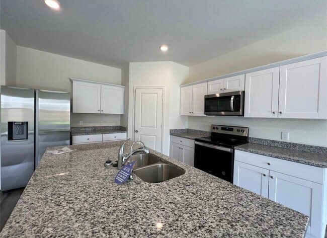 Building Photo - 1005 Wild Enclave Ln