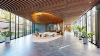 This striking lobby in Bethesda, MD is a masterclass in contemporary commercial design, offering a generously proportioned single-floor space that immediately impresses with its architectural ambition. A continuous slatted wood ceiling runs the length of the lobby, warming the interior and creating a sense of organic cohesion. A sculptural suspended wood canopy serves as the visual centerpiece, hovering above a sunken circular lounge area anchored by a sleek freestanding fireplace and a low curved platform, surrounded by mid-century modern lounge chairs. Polished large-format stone tile flooring extends throughout, reflecting abundant natural light that pours in through expansive floor-to-ceiling glass curtain walls lining the perimeter. These windows frame lush outdoor greenery, seamlessly connecting the interior to the surrounding landscape. Thoughtfully placed potted tropical plants reinforce the biophilic design throughout the corridor and seating areas. Textured grey brick and concrete accent walls punctuate key entry points, while vertical wood slat partitions add privacy and warmth. A secondary wing features a distinctly designed ceiling with sculptural disc light fixtures, live-edge wood benches, and curated landscape photography, offering a quieter, gallery-like atmosphere. The overall ambiance is refined, welcoming, and unmistakably modern.