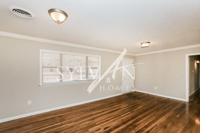 Building Photo - The living is easy in this 3 bedroom, 2 ba...