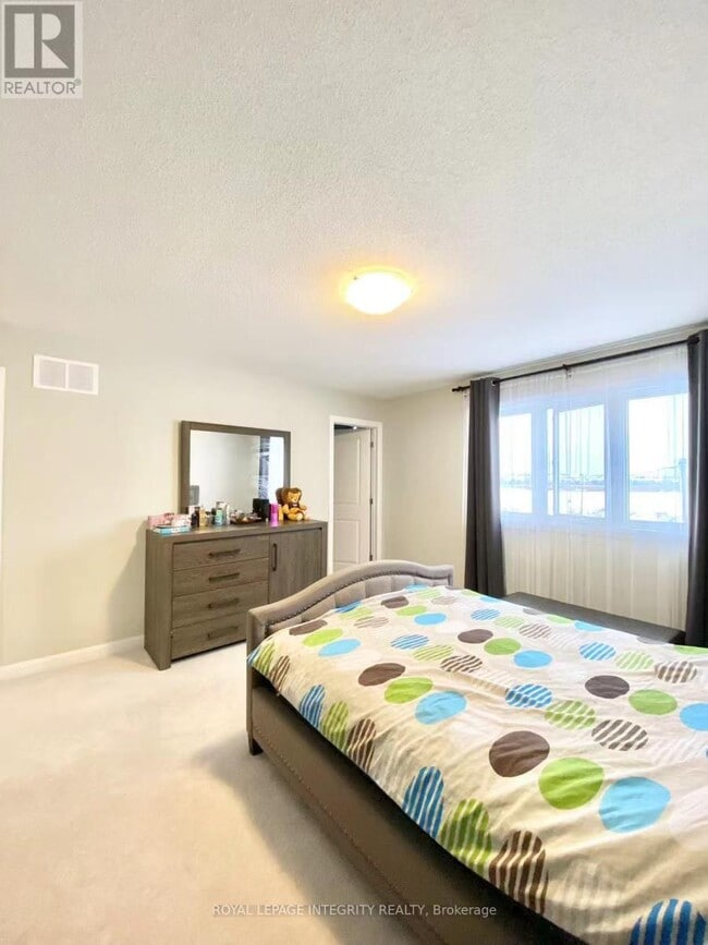 Photo du bâtiment - 1045 Speedvale Ct