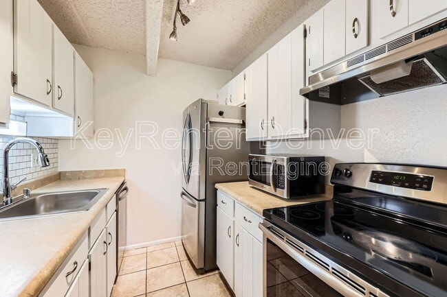 Building Photo - 8060 E Girard Ave
