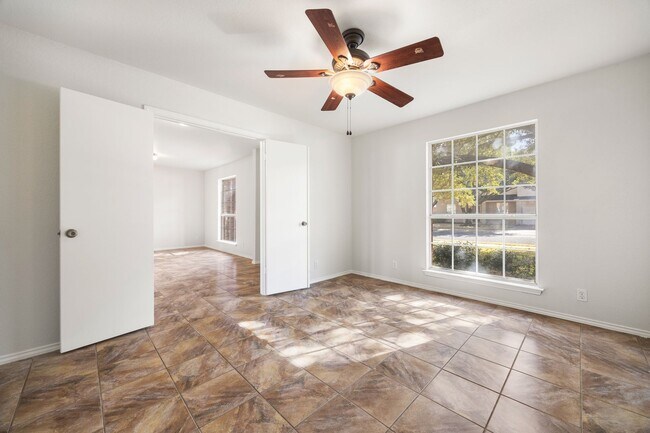 Building Photo - Spacious 6-Bedroom Home with Game Room, Covered Patio & Upgraded Baths