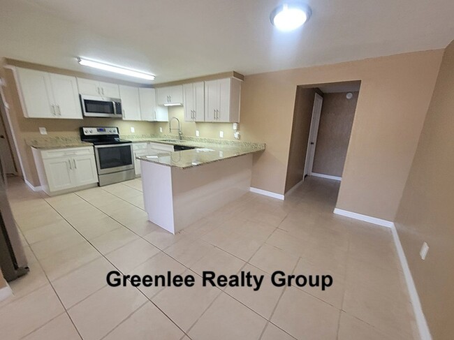Building Photo - Charming & Spacious 4-Bedroom, 2-Bath Home...