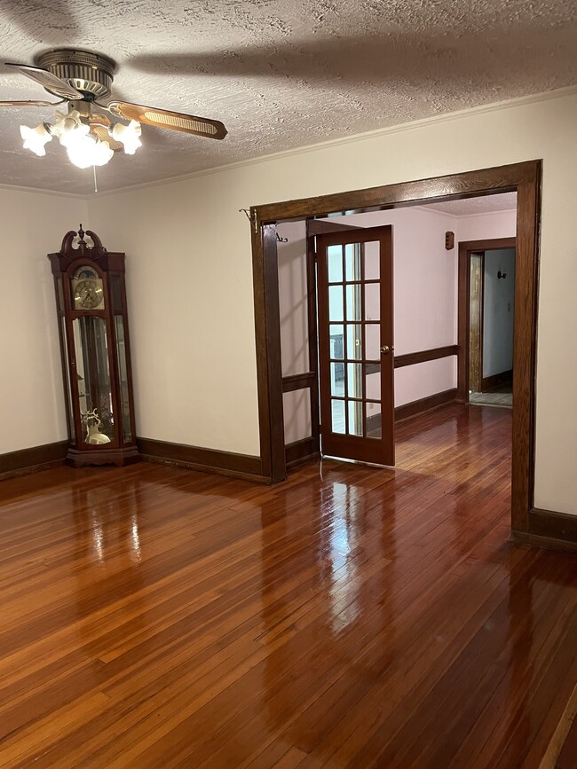 Classic hardwood floors, french doors & crown moldings - 340 Highland Ave