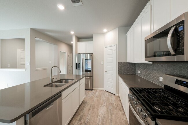 Building Photo - Where Style Meets Function in a Prime Setting