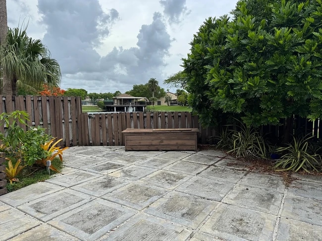 Backyard with landscape lighting. - 13169 SW 91st Ct