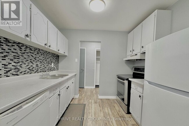 Photo du bâtiment - 635 Wonderland Rd S