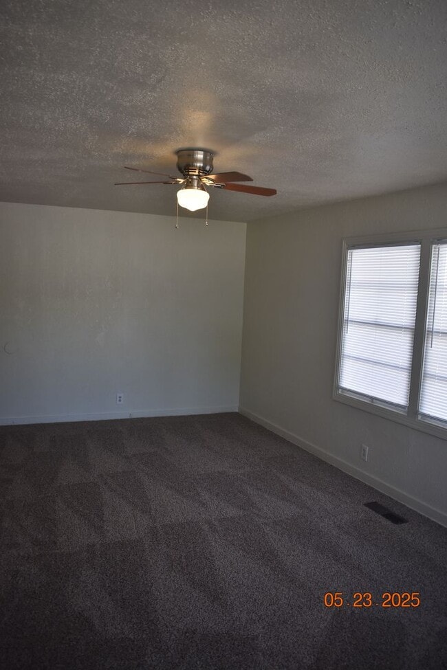 Building Photo - Charming Three Bedroom Home with New Carpe...