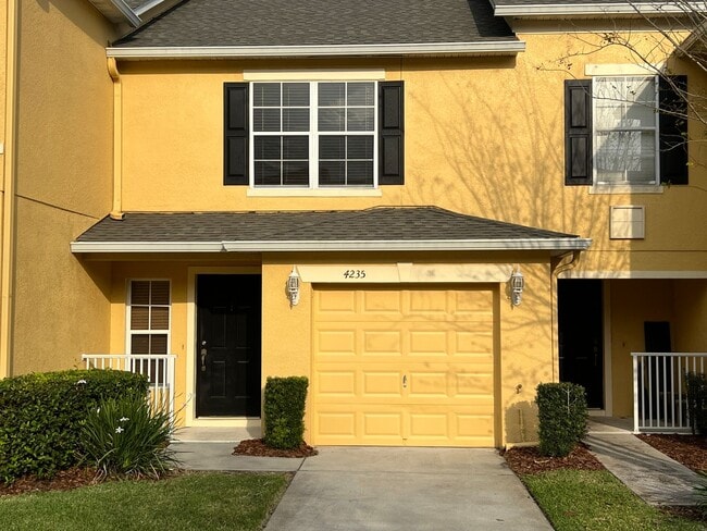 Photo - Bright 2BR 2.5BA Home w/ Community Pool/Playground Access • Full-Size Appliances • 1-Car Garage i...