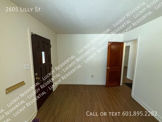 Building Photo - Welcome to this charming 4-bedroom, 2-bath...