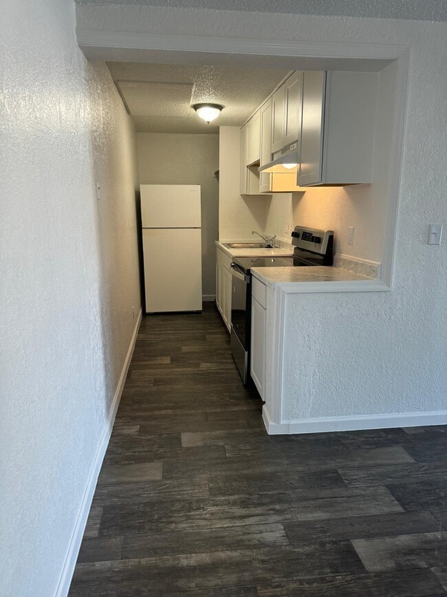 Building Photo - Blossom Corners Apartments