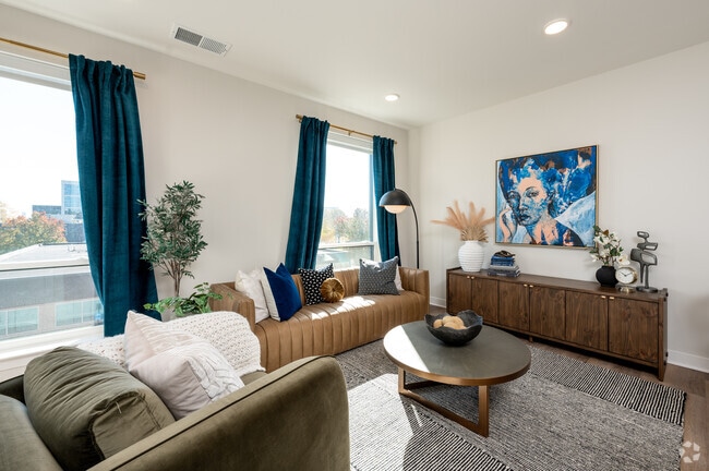 1BR, 1BA - 707SF - Living Room - Vanguard at 16 Tech
