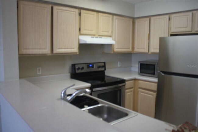 Foto del edificio - 13929 Fairway Island Dr