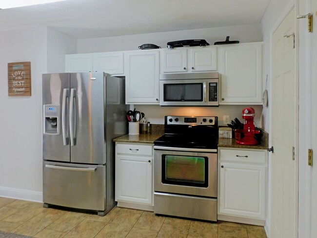 Building Photo - Colonial with Finished Basement and 2 Car ...
