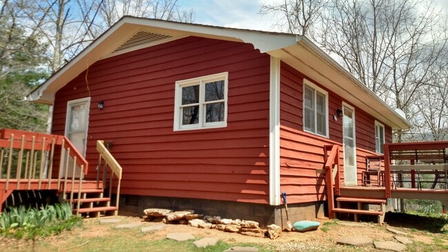 Side View with Living Room Windows and Kitchen Door - 210 Madison Rd