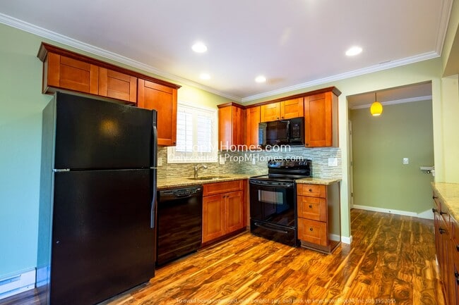 Building Photo - Tranquil Two-Bedroom Condo Overlooking Lak...