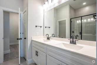 3BR, 2BA - 1,369SF - Primary Bathroom - Canopy Homes at Woodcreek