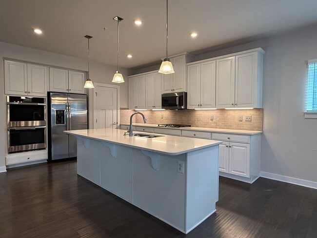 Building Photo - Stunning Greenleigh Home with 4 Bedrooms, 4.5 Baths & Designer Kitchen