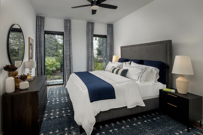 Spacious bedroom with large windows and natural light - AMLI Atlantic Station
