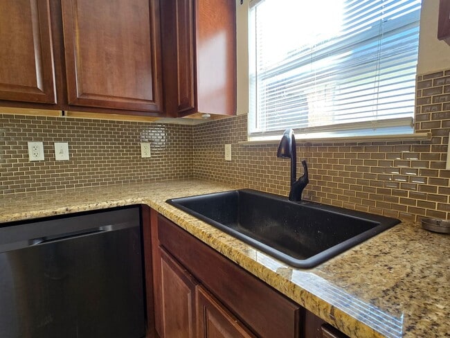 Building Photo - NEW IN MANAGEMENT - AVAILABLE NOW!