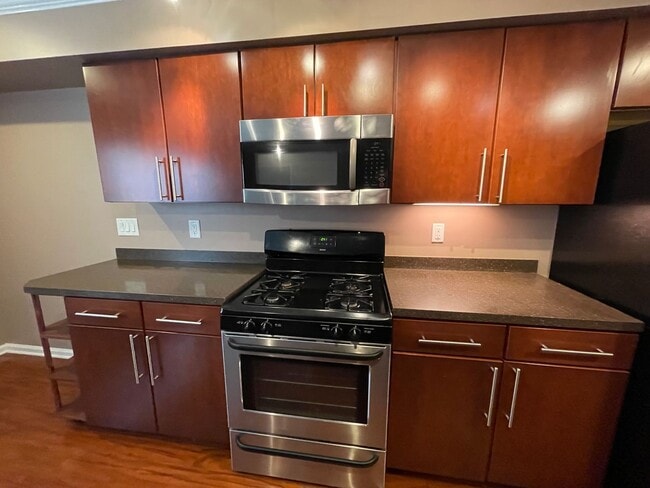 Building Photo - COMING IN AUGUST! Attractive Condo, Lots o...