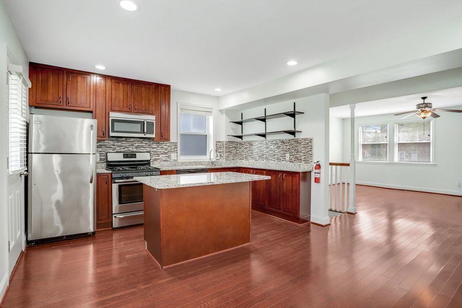 Primary Photo - Contemporary Three-Bedroom in the Heart of...