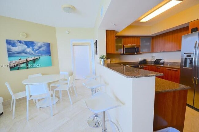 Building Photo - 16699 Collins Ave