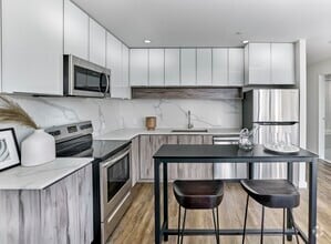 Building Photo - Indigo 141: NEW Boutique Collection of Units
